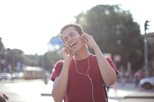 Man singing with headphones on